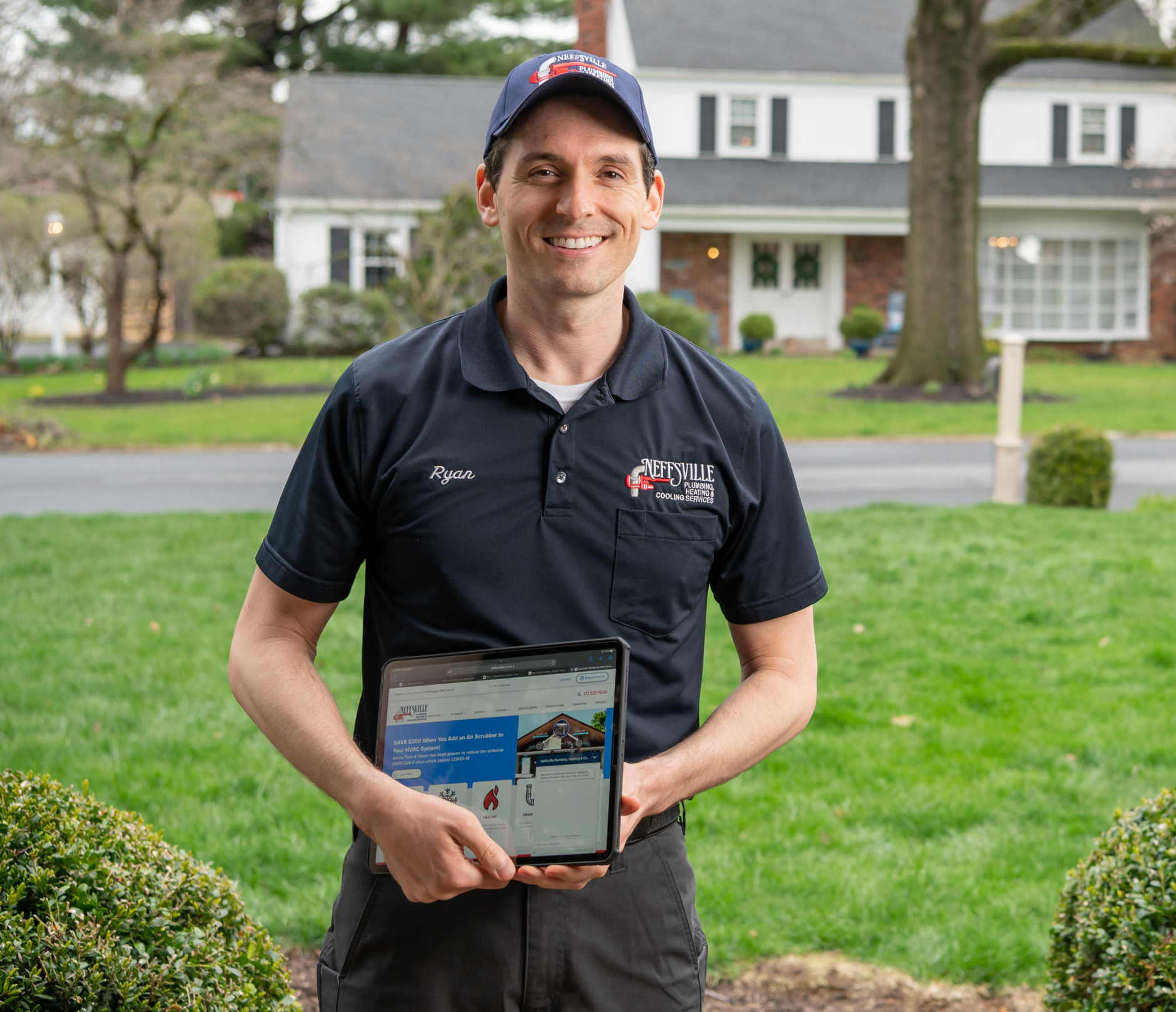 a home service technician standing in front of a home