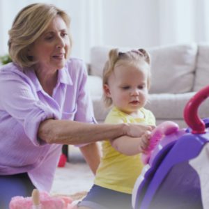 A woman and a child playing.