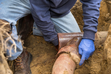 Neffsville employee working on sewer line