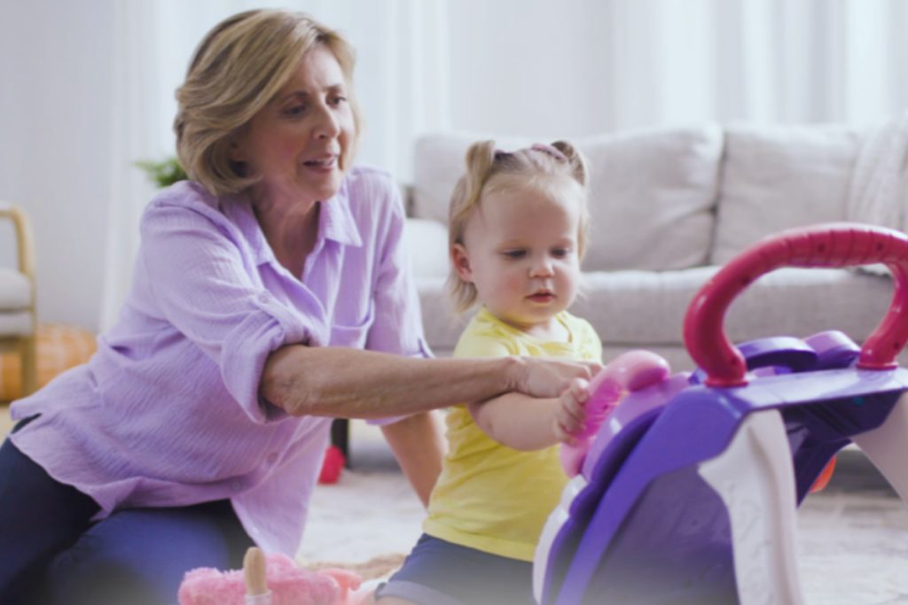 A woman and a child playing.