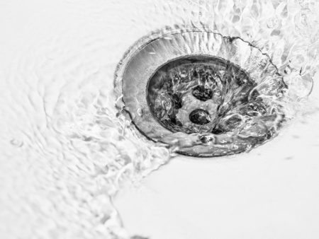 water flowing down a drain